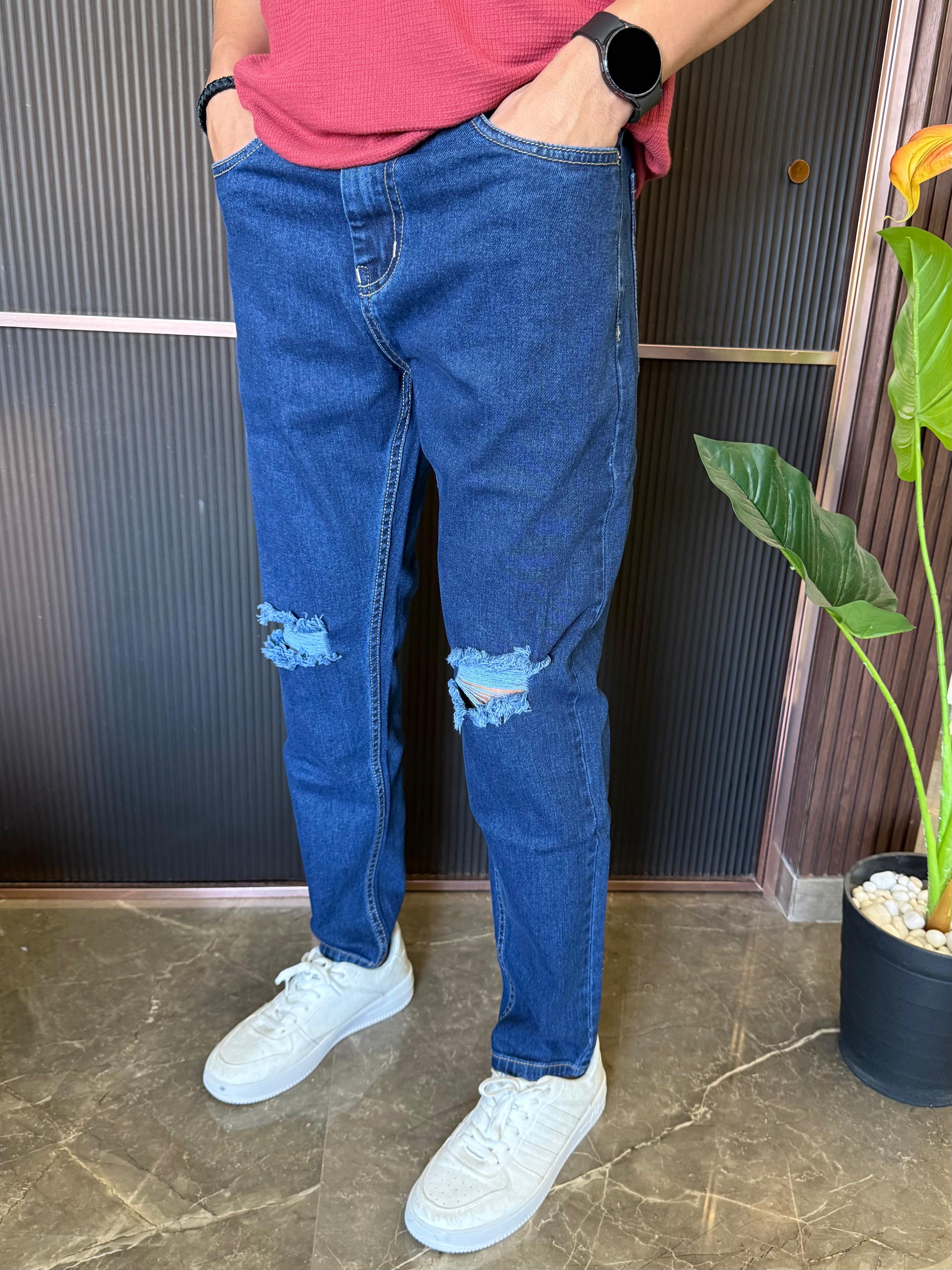 Knee Distressed Mid Blue Jeans