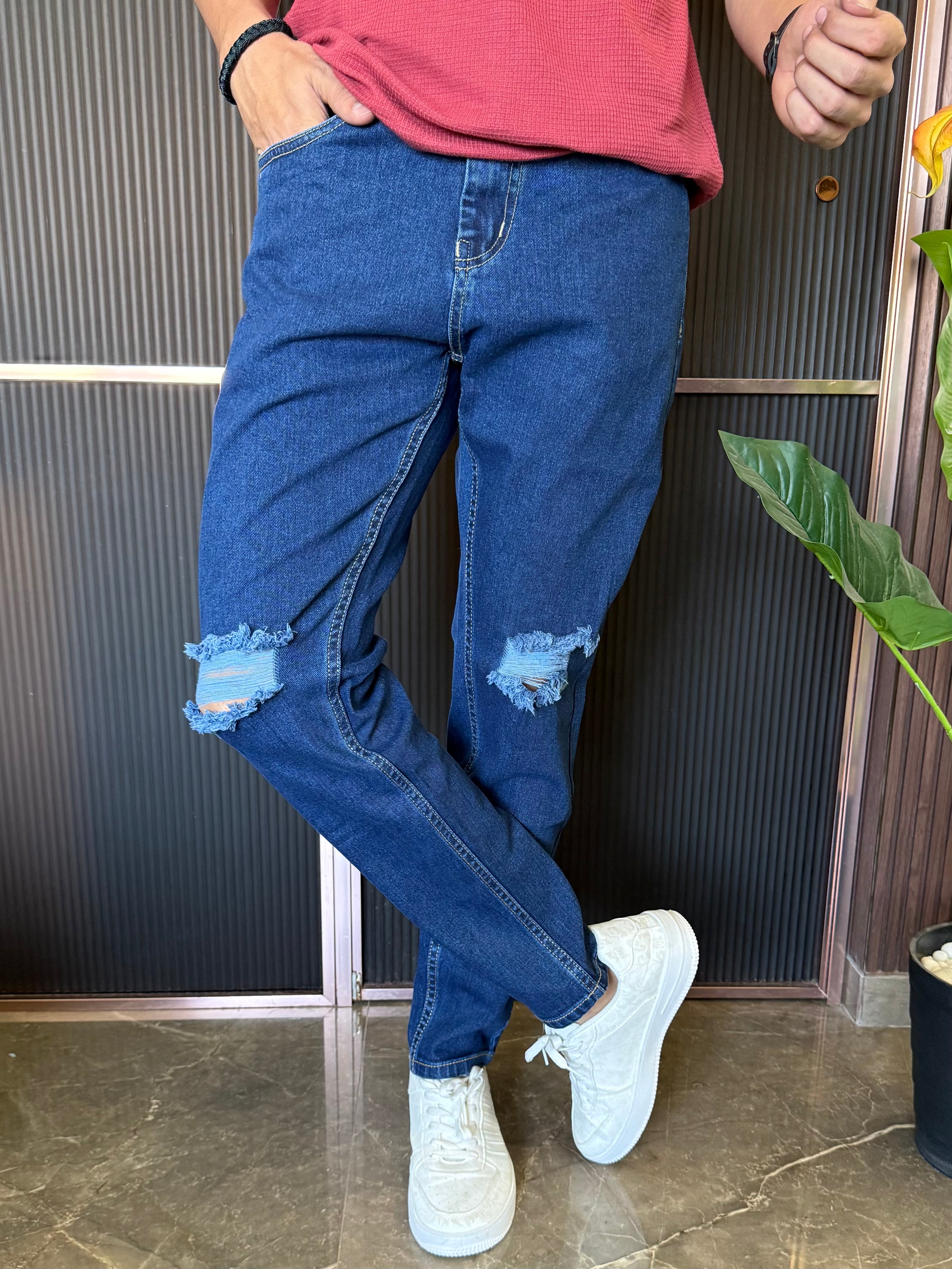 Knee Distressed Mid Blue Jeans
