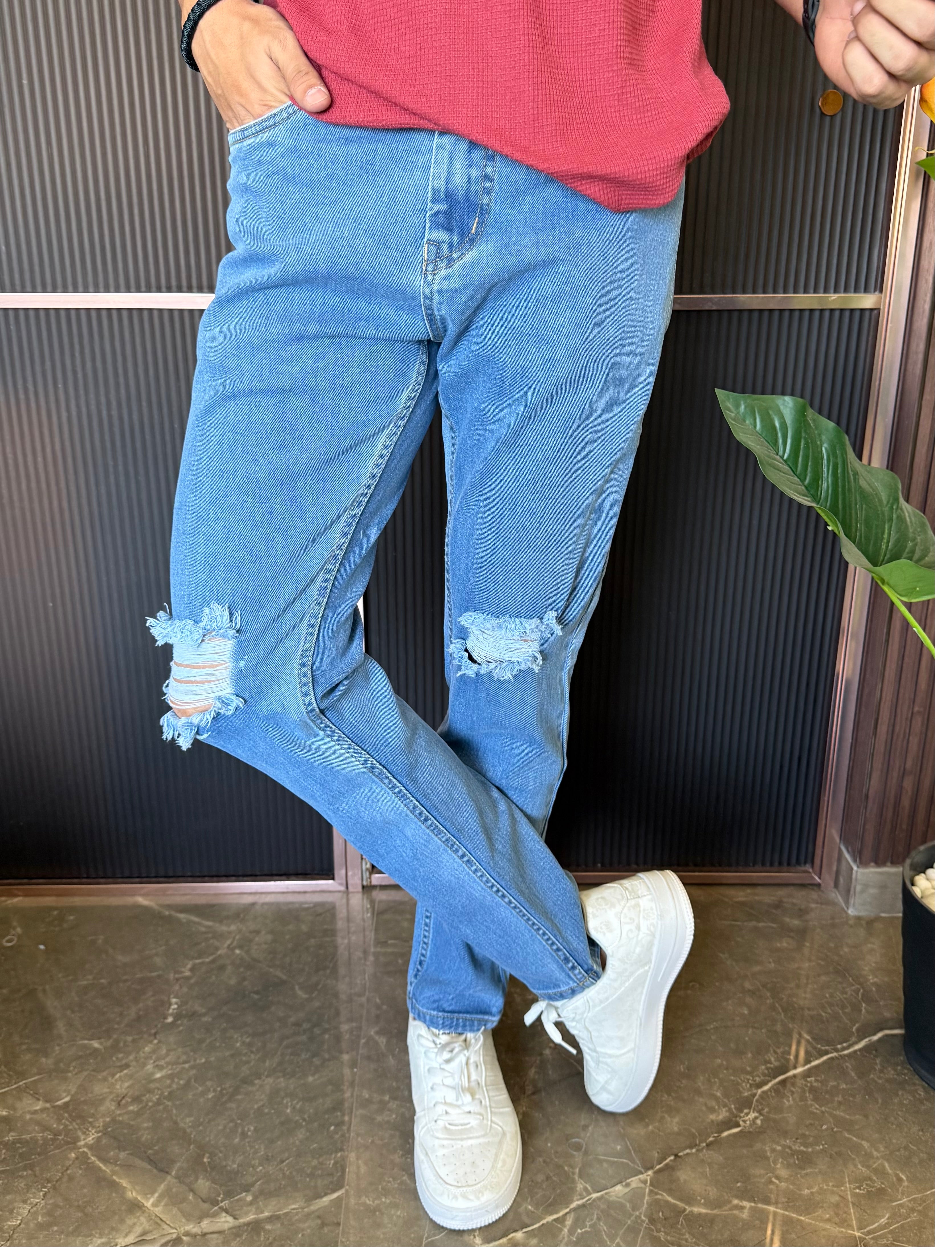 Knee Distressed Light Blue Jeans
