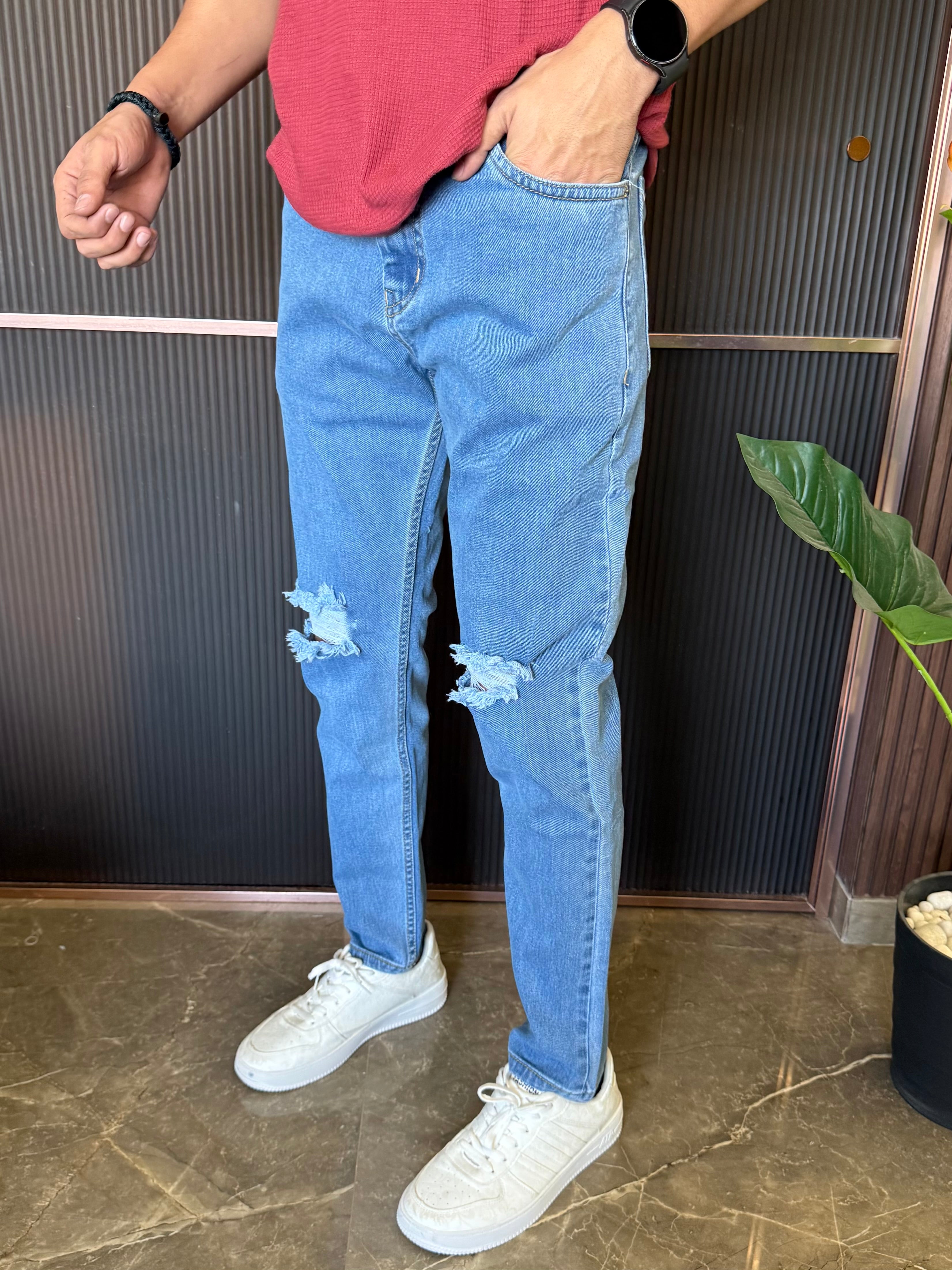 Knee Distressed Light Blue Jeans