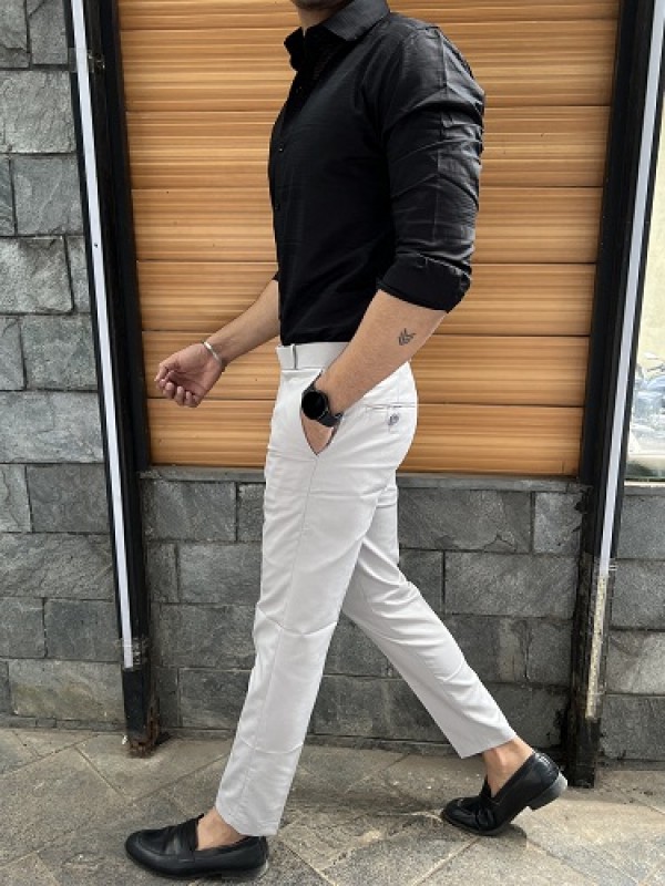 black shirt and off white pants